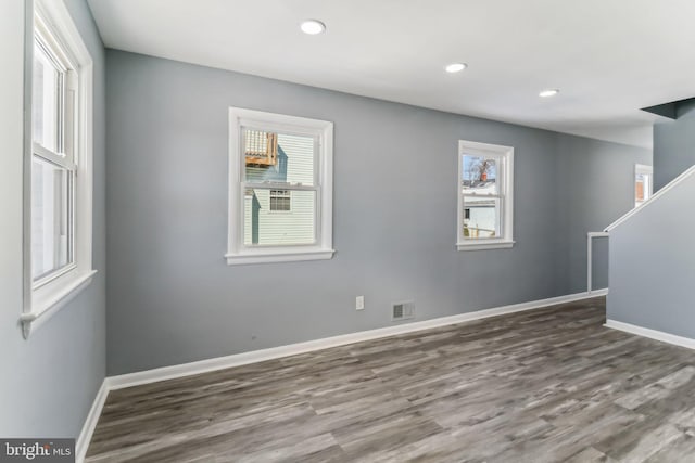 empty room with wood-type flooring