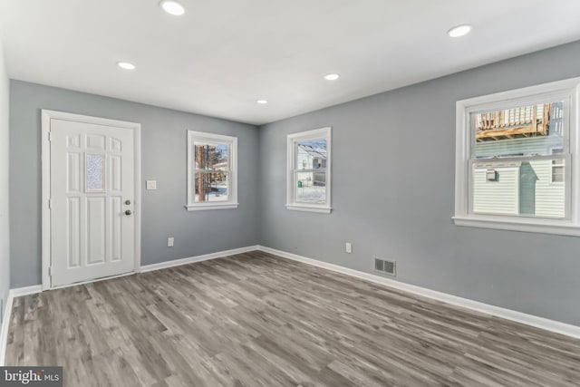 unfurnished room featuring wood-type flooring