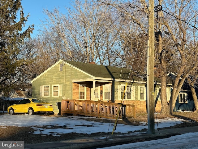 view of front facade featuring a deck