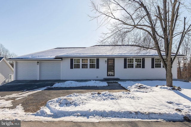 ranch-style home with a garage