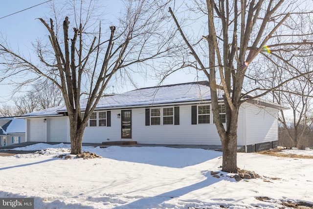 single story home featuring a garage