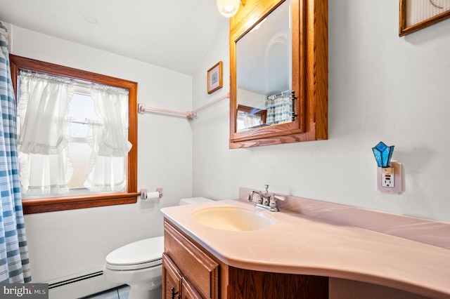 bathroom with toilet, baseboard heating, and vanity