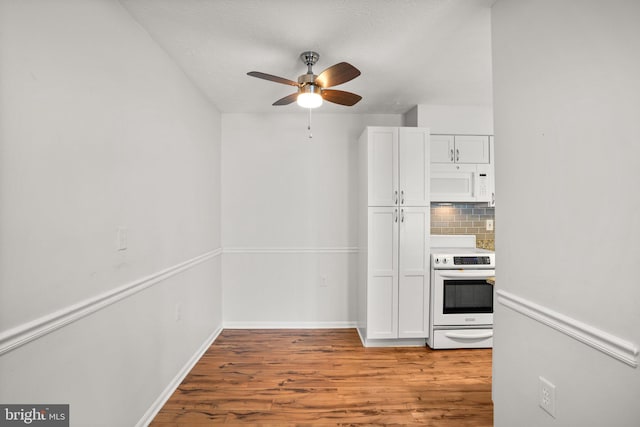 kitchen with light hardwood / wood-style flooring, decorative backsplash, electric range, white cabinetry, and ceiling fan