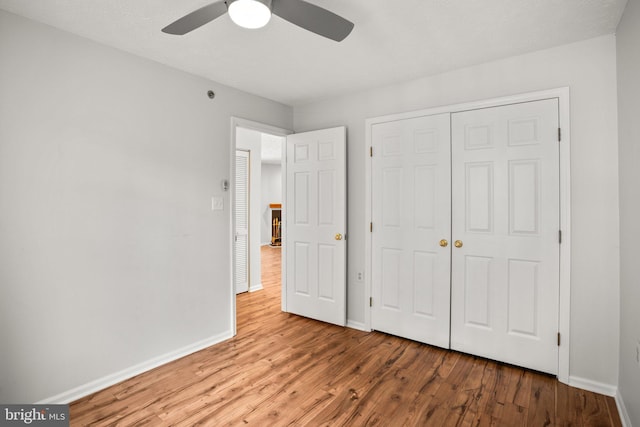 unfurnished bedroom with a closet, ceiling fan, and light hardwood / wood-style floors