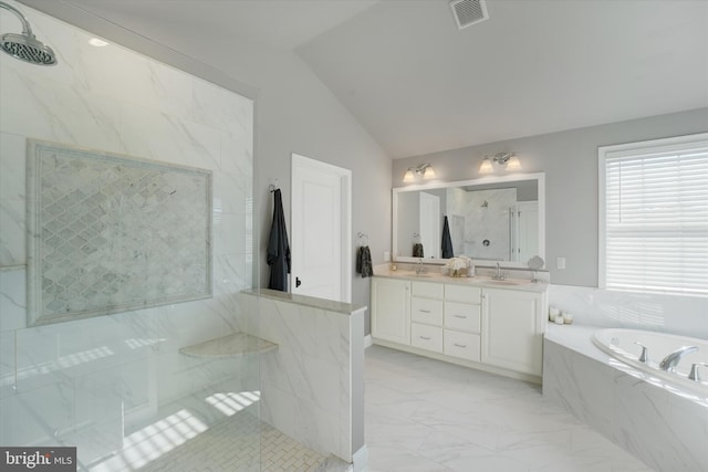 bathroom featuring lofted ceiling, vanity, and plus walk in shower