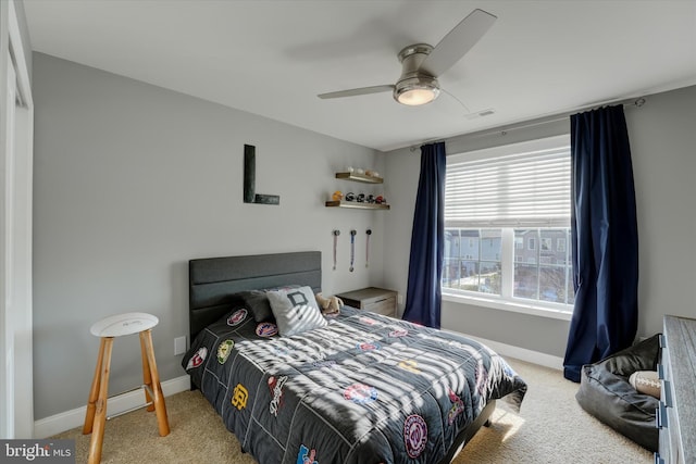 carpeted bedroom with ceiling fan