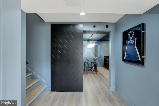 hallway featuring light wood-type flooring