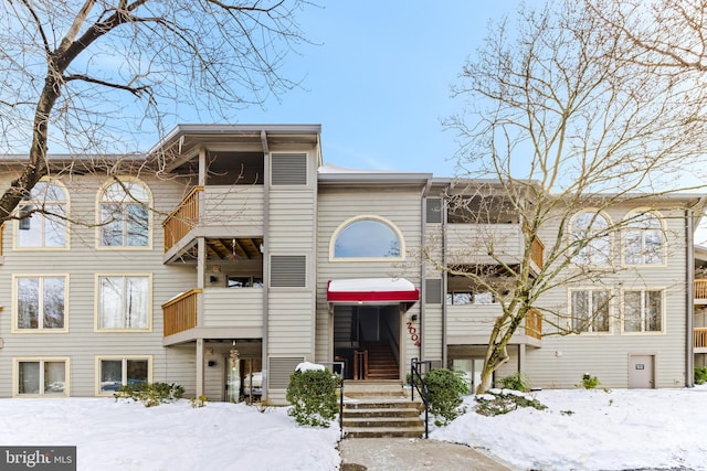 view of snow covered property