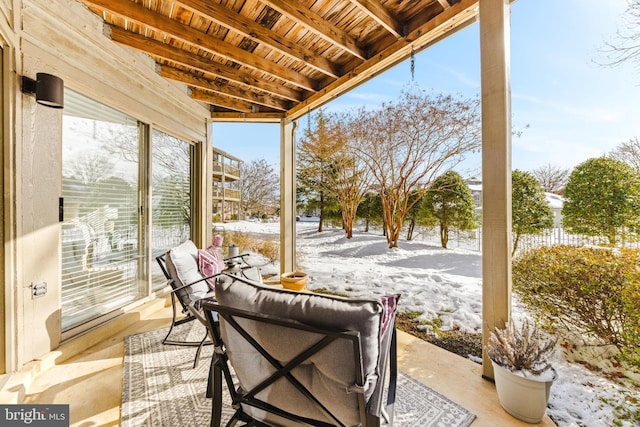 view of snow covered patio