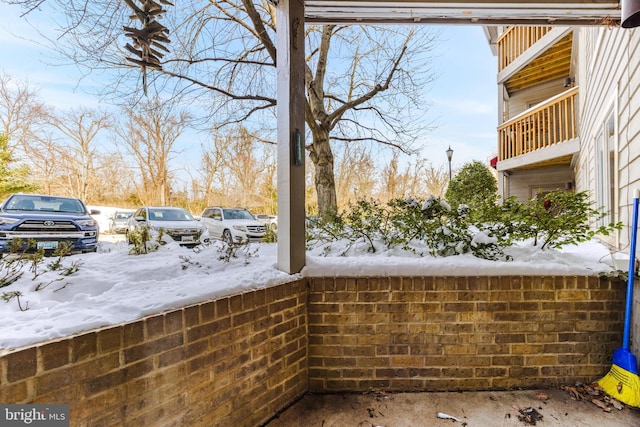 view of snow covered patio