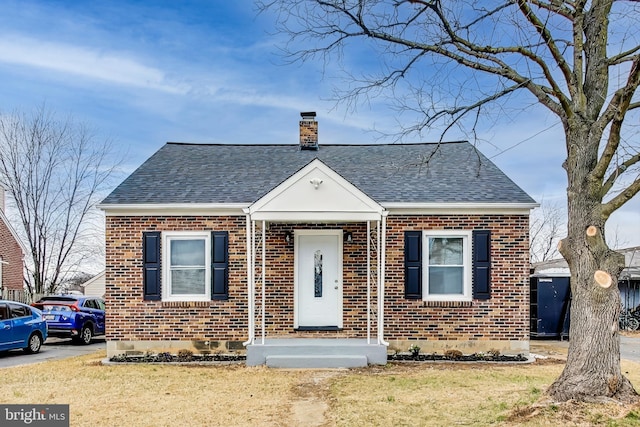 bungalow with a front lawn