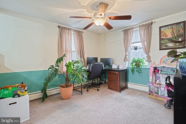 home office with carpet flooring, baseboard heating, and ceiling fan