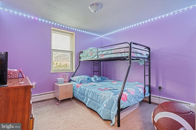 bedroom featuring a baseboard heating unit