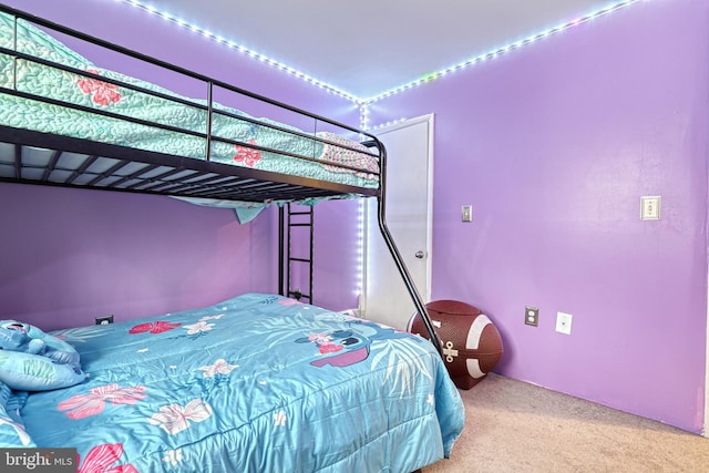 bedroom featuring carpet flooring