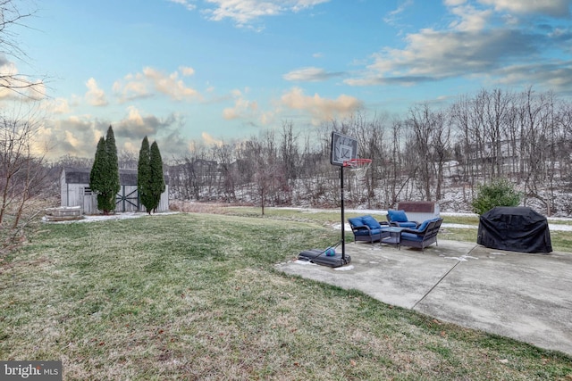 view of yard with a storage unit, a patio area, and an outdoor hangout area