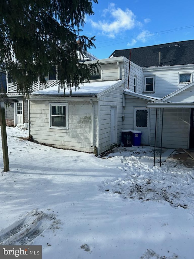 view of snow covered property