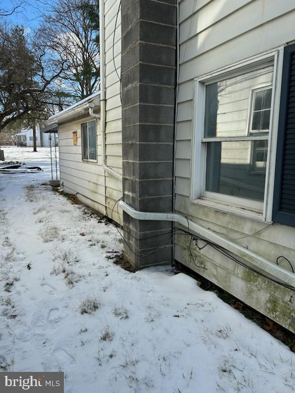 view of snow covered property