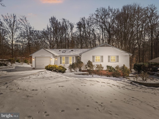 view of front of property featuring a garage