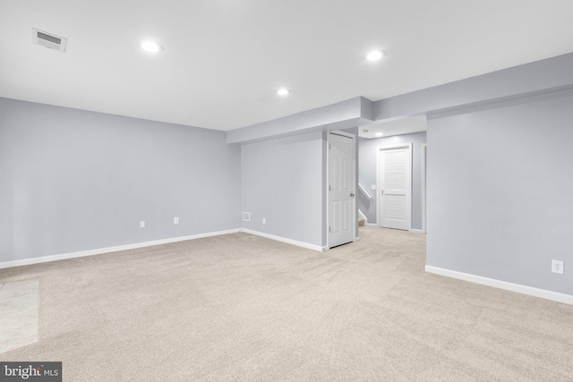 basement with light carpet