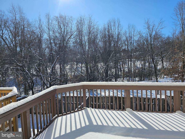 view of snow covered deck