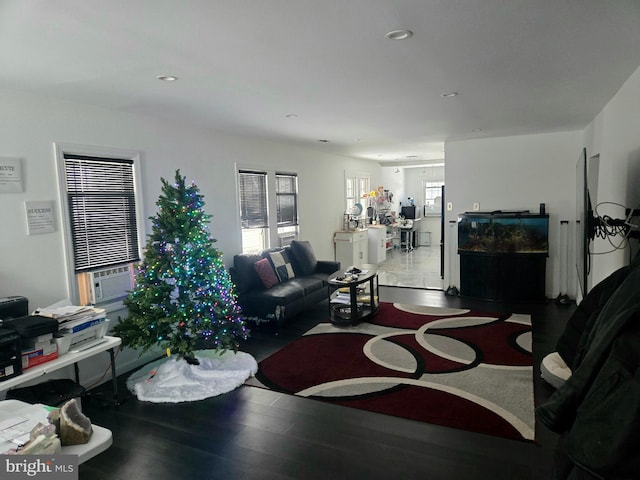 living room featuring hardwood / wood-style flooring and cooling unit
