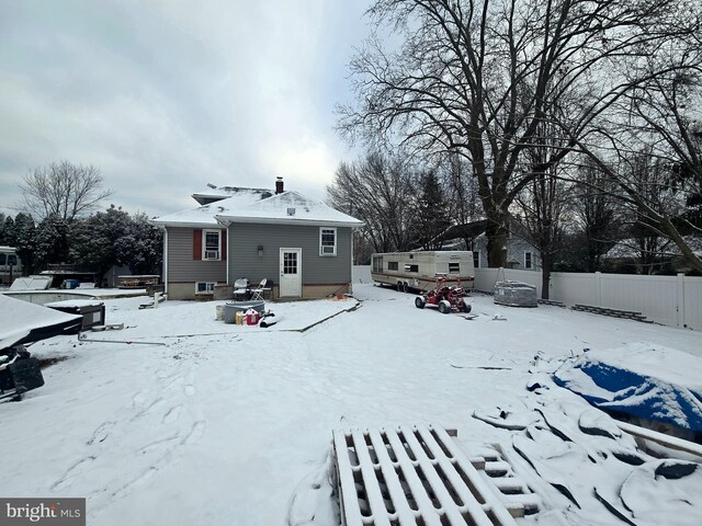 view of snow covered property