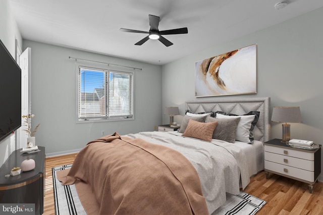 bedroom featuring ceiling fan and light wood-type flooring