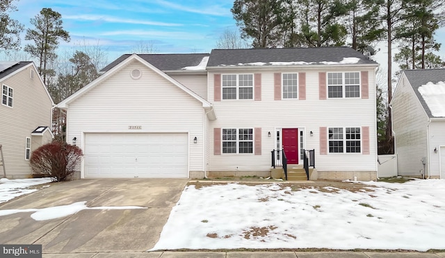 colonial inspired home with a garage