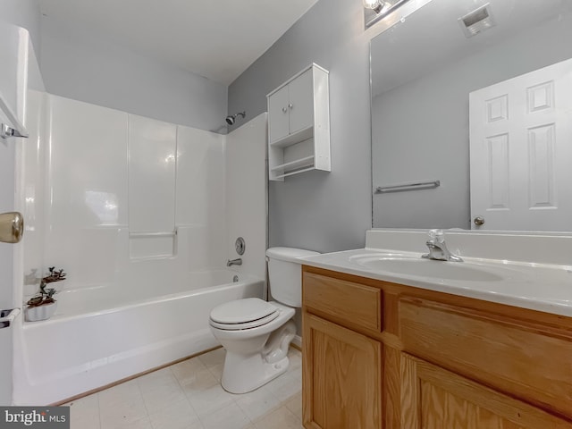 full bathroom featuring toilet, bathing tub / shower combination, and vanity