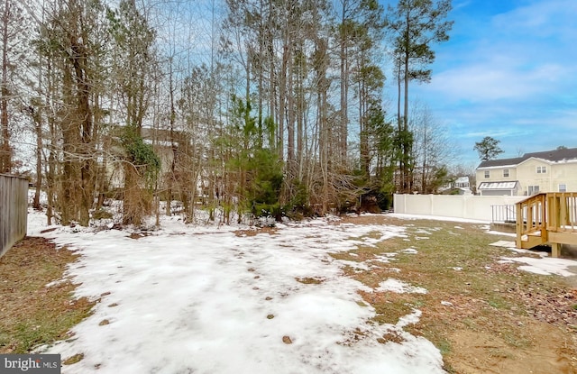 view of yard covered in snow