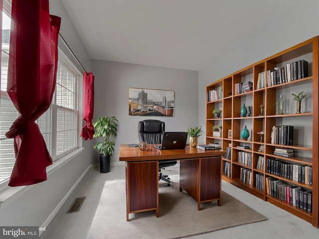 view of carpeted office space