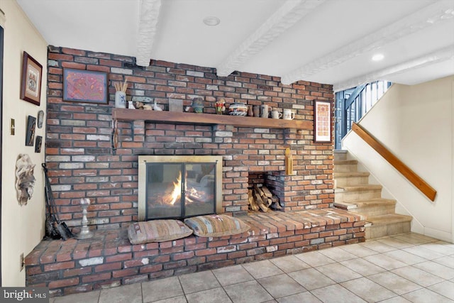 room details featuring a brick fireplace and beamed ceiling