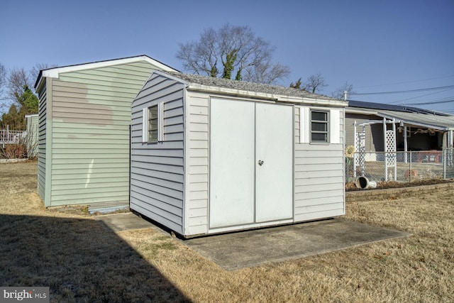 view of outdoor structure with a yard