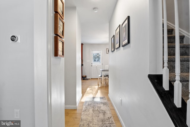 hall featuring light hardwood / wood-style floors