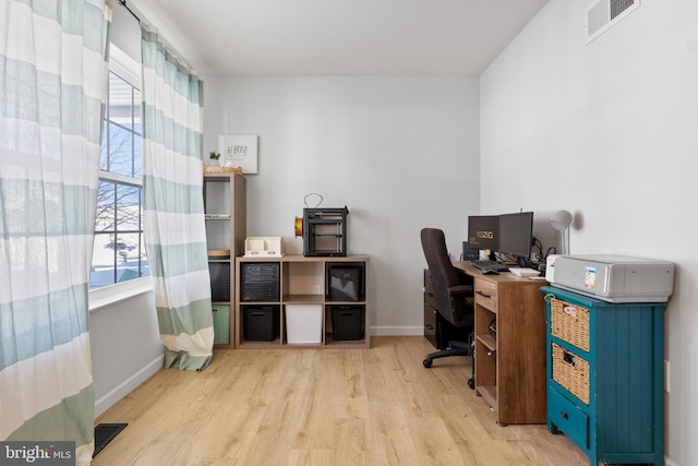 office area featuring light hardwood / wood-style flooring