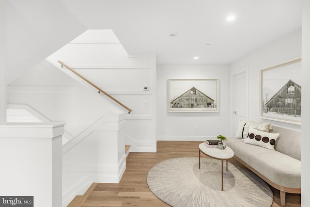 sitting room featuring light wood-type flooring