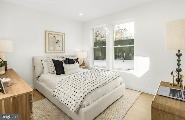 bedroom featuring light hardwood / wood-style floors