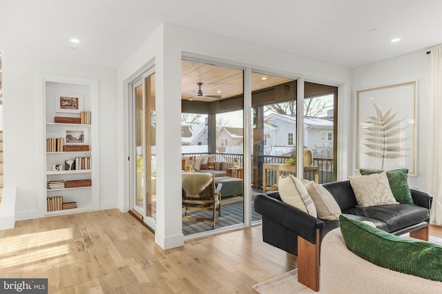 interior space featuring ceiling fan and light hardwood / wood-style flooring