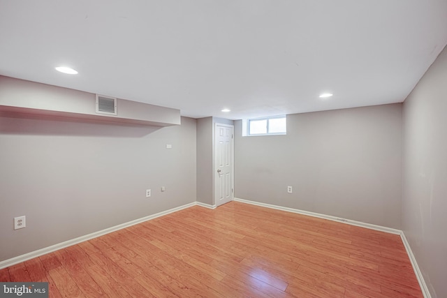 basement with light wood-type flooring