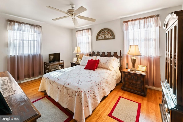 bedroom featuring ceiling fan and light wood-type flooring