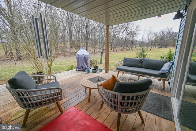 wooden deck featuring outdoor lounge area