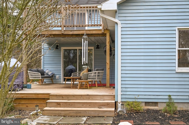 wooden terrace featuring covered porch