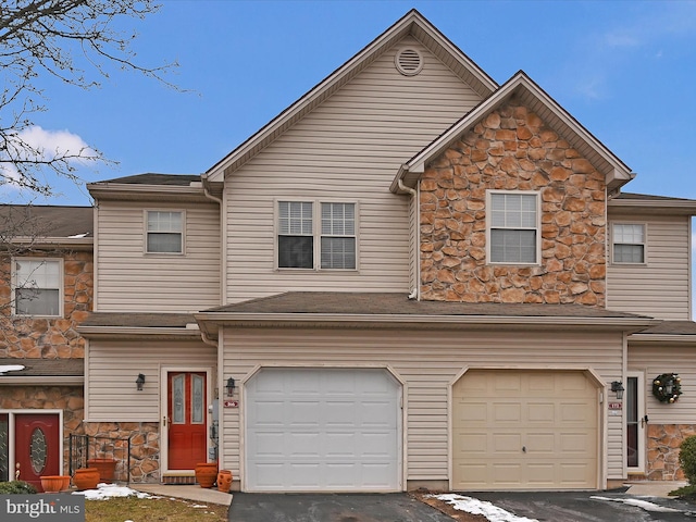 view of front of property with a garage