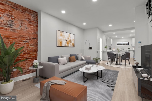 living room with light hardwood / wood-style floors