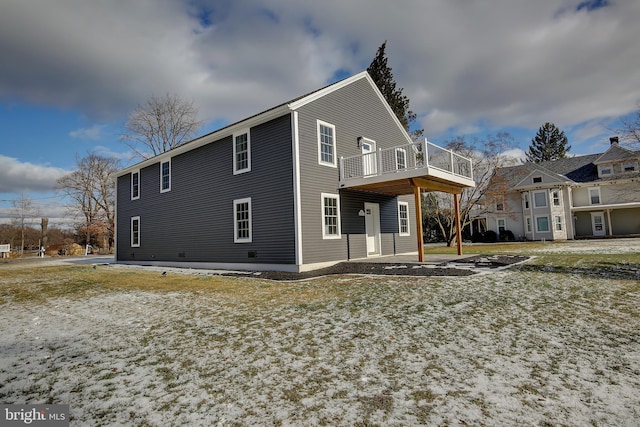 rear view of house with a patio area and a deck