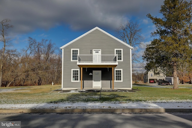 view of front of home with a front yard