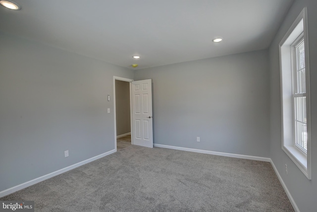 view of carpeted spare room