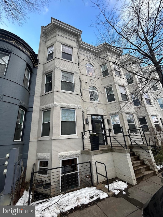 view of snow covered building