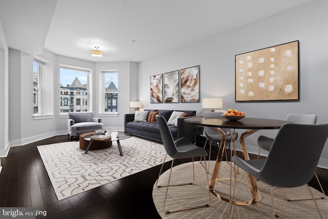 living room featuring dark hardwood / wood-style floors