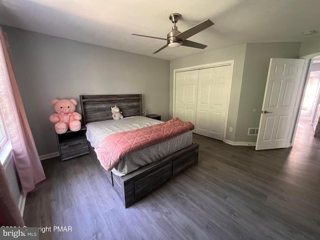 bedroom with ceiling fan, a closet, and dark hardwood / wood-style floors